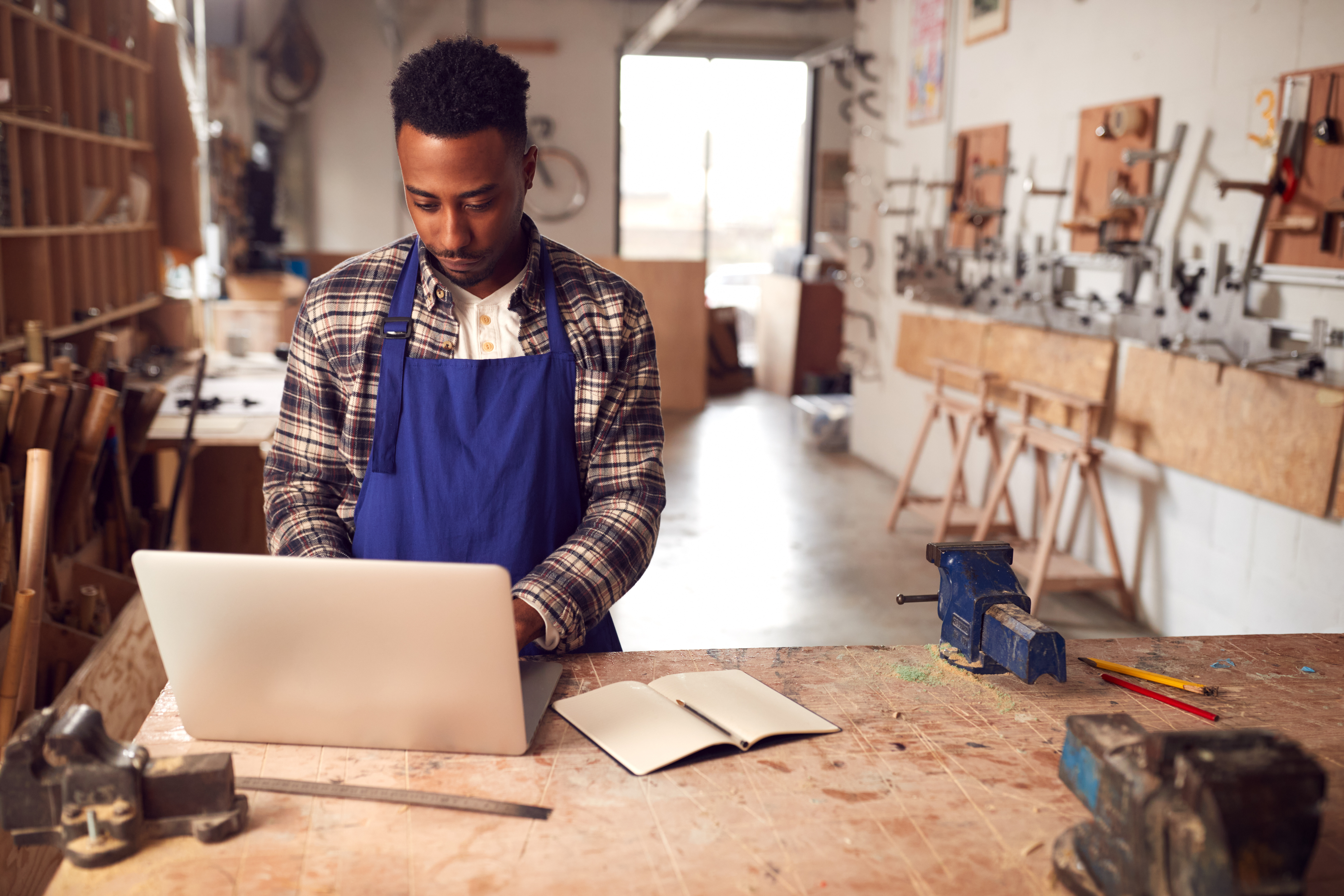 Small business owner using laptop